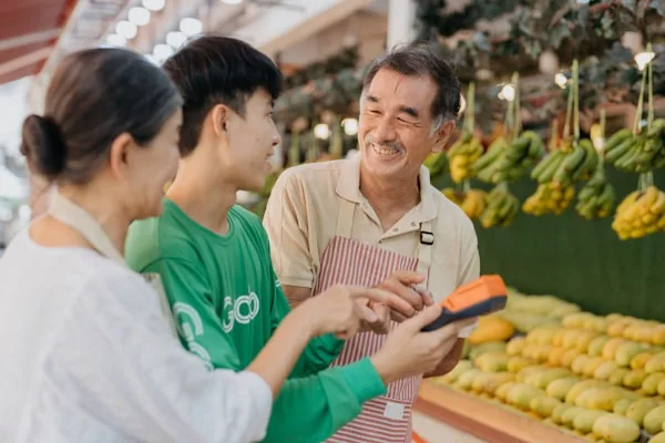 Retailer using a mobile device with SMART POS